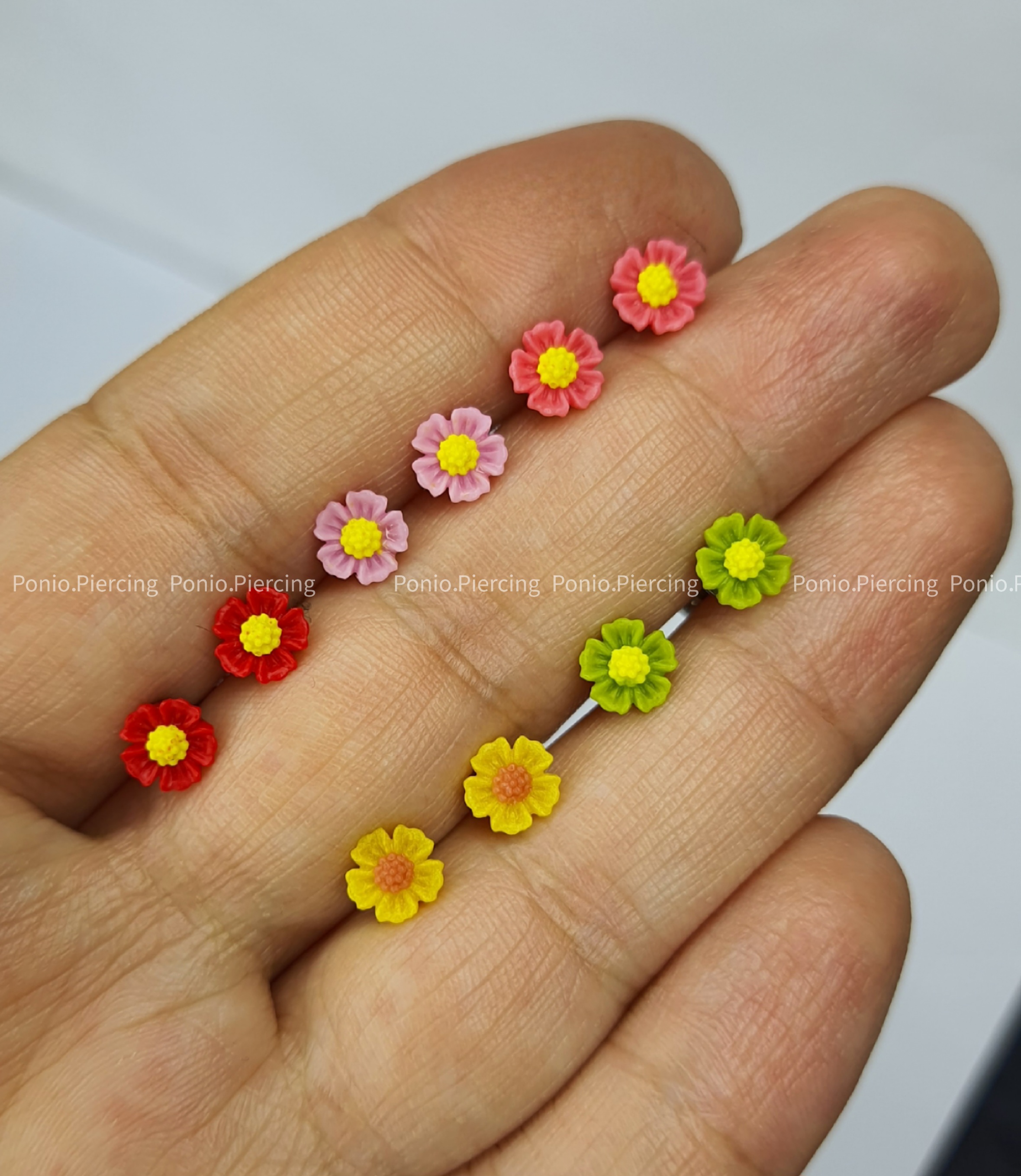 پیرسینگ گوش گل های تابستونی