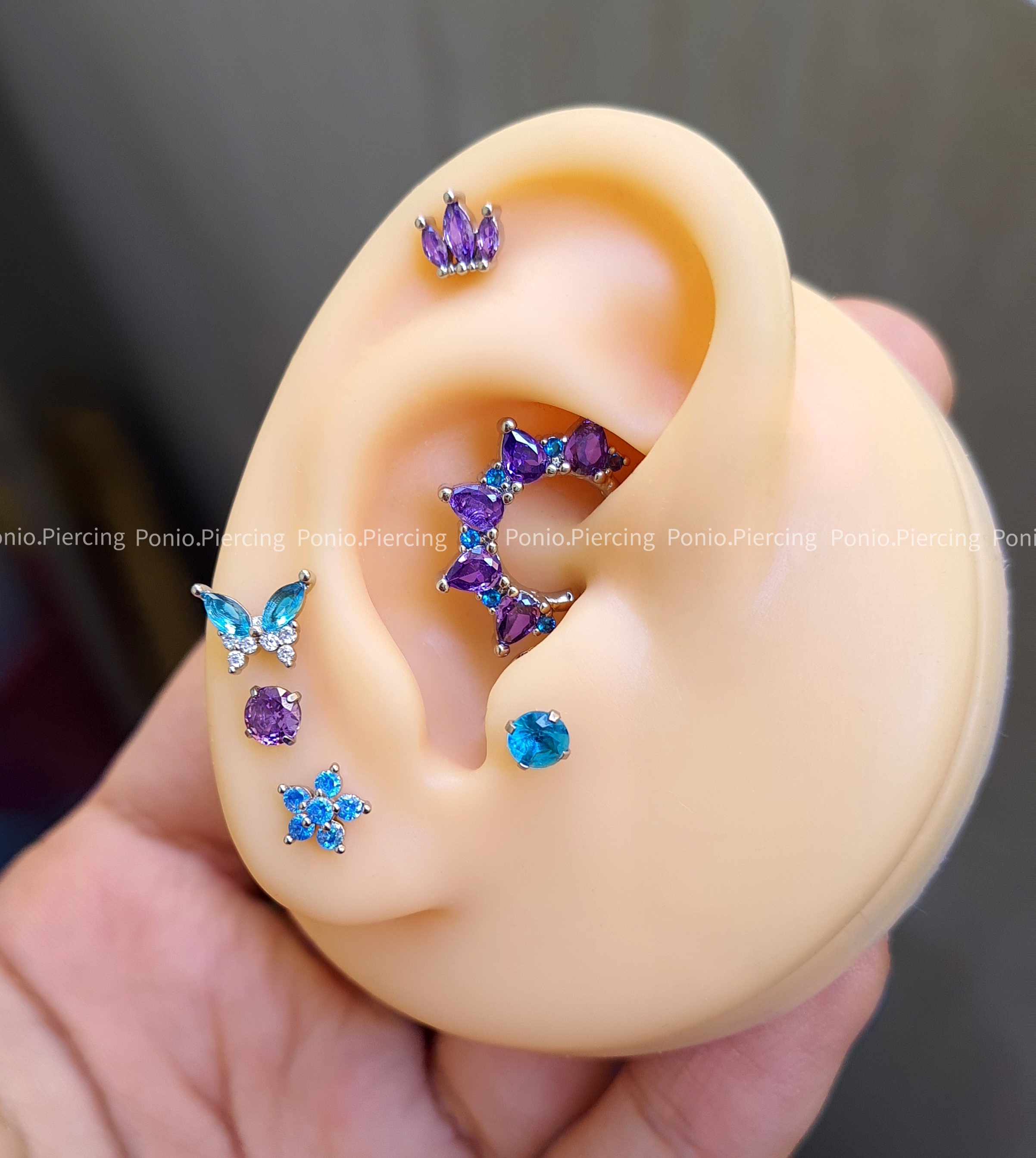 پیرسینگ گوش آبی بنفش 💙💜